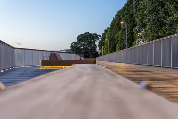 Downtown waterfront walkway and viewing platform with architectural features and lighting effect