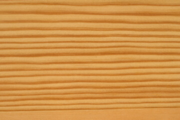 Warm wooden texture showcasing natural grain patterns and soft color