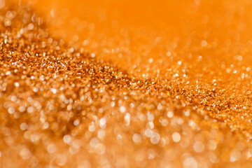 Gold mockup with text space.Wallpaper phone shining glitter. Highlights on golden texture.Golden relief texture.Shimmering gold texture.Festive New Year and Christmas Wallpaper. 