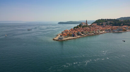 Panoramic aerial drone view of a picturesque medieval town of Piran. Tranquil Adriatic Sea coast. Slovenia