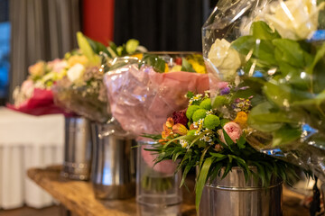 Colorful floral arrangements displayed at a gathering venue ready for celebration