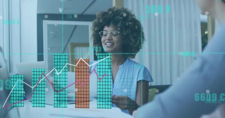 Woman wearing glasses lifting report, generating charts and graphs and explaining business metrics - Powered by Adobe