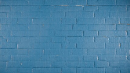 Obraz premium blue brick wall texture showing subtle variations and uniform pattern with natural lighting