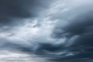 Obraz premium Storm Clouds with Dramatic Gray and White Formations for Atmospheric Weather Photography and Powerful Sky Scene