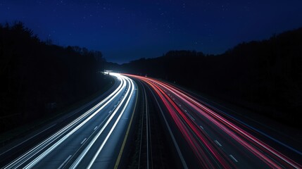 Blurred car lights on a highway at night. Suitable for backgrounds, transportation concepts, urban nightscapes, and motion blur themes.