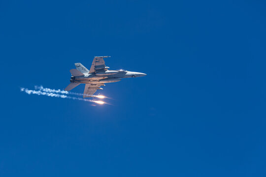 Super Hornet dropping flares during aerial display.