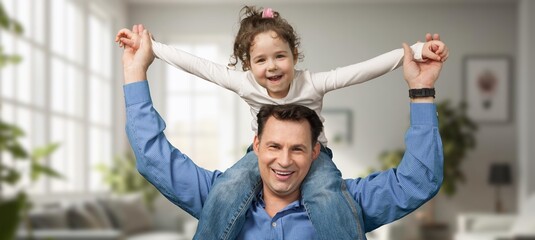 Loving cheerful father with small kid daughter