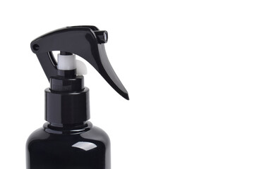 Close up of black spray bottle isolated on white background
