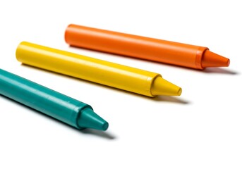 Three vibrant crayons on a white background
