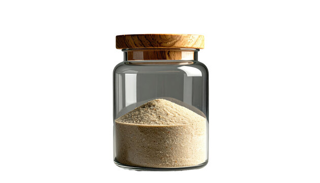 Sand-colored powder within a clear glass jar with a wood grain lid, isolated on a black background