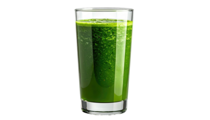 Green smoothie in a clear glass against a black background shows blended drink