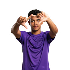 Fototapeta premium Young African American man in a purple t-shirt making a camera frame gesture with his hands, looking directly at the viewer with a focused expression on a transparent background.