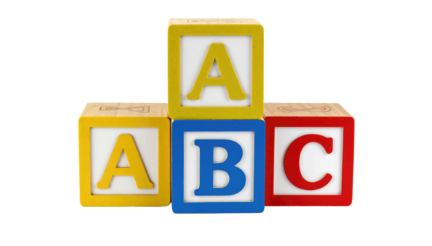 Colorful wooden toy blocks stacked featuring the letters "A", "B", and "C" against a stark black backdrop