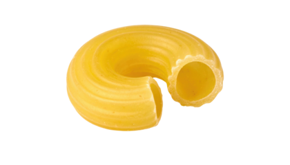 Close-up of a single, curved elbow macaroni noodle against a stark black background, highlighted by bright illumination