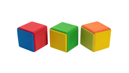 Obraz premium Three colorful foam cubes, red/blue, green/yellow, orange/yellow, rest on a plain black background