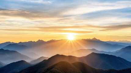 Obraz premium Breathtaking sunrise over mountains, soft pastel colors illuminate sky, creating peaceful