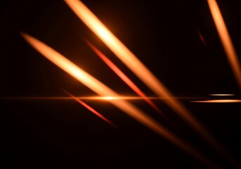 Abstract orange light streaks on a dark background