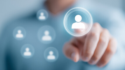 A finger pressing a user profile icon on a digital interface to symbolize personalized customer selection, segmentation, and CRM decision making.
