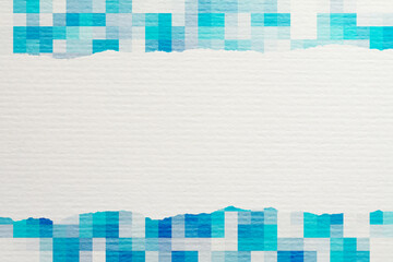 白い紙と青色のモザイク