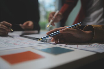 Professional interior designer at workplace in office, closeup