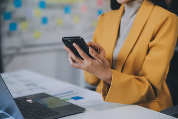 Group of Young Asian business team creative businesspeople coworker in office Happy to be successful partnership teamwork celebrating achievement and success concept.