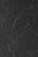 Dark grey black slate background or texture.