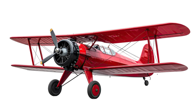 Red biplane, front view with propeller, on black background