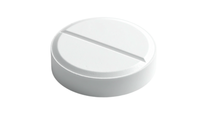 Round white pill, bisected, on a black background, close-up