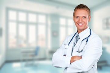 Portrait of confident doctor at work in hospital