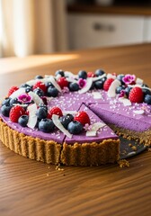Gourmet blueberry cheesecake decorated with fresh mixed berries, coconut flakes, and edible flowers. Delicious no-bake dessert with strawberries and raspberries on graham cracker crust. Closeup.