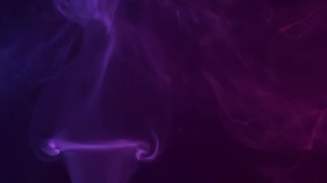 Seamlessly Looping Video of Swirling Purple and Magenta Luminous Smoke Patterns smoke patterns, dreamlike, texture