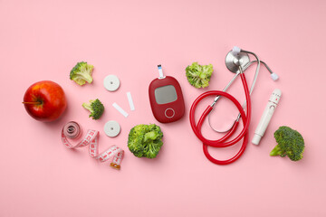 Medical gear and healthy foods on a pink backdrop
