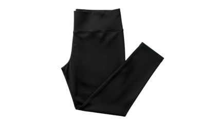 Folded black athletic apparel item presents elegantly against a dark background.