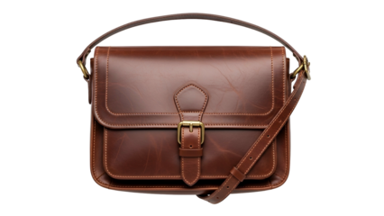 Rich brown leather satchel features traditional brass hardware and adjustable shoulder strap against a dark backdrop