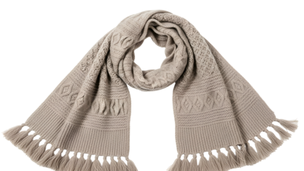 Knitted textile accessory featuring cable patterns and tasseled ends displayed against a dark background