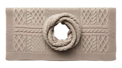 Knitted wool accessory featuring intricate cable patterns displayed against a dark background