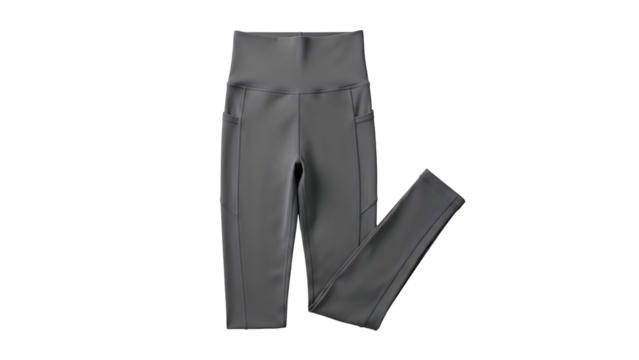 Close up view of athletic form fitting bottoms with pockets displayed against a dark background