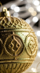 Ornate Gold Ornament Close-up with Bokeh Lights Background