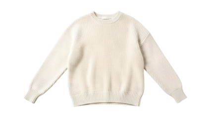 Cream colored knitted garment displays a textured waffle weave pattern against a dark background