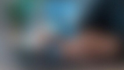 Close up abstract blurry background with muted colors and soft textures