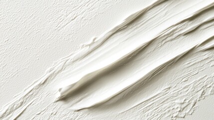 Obraz premium Cream paint strokes on canvas. Abstract background. Possible use Product photography, design inspiration