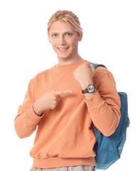 Fototapeta premium Male student pointing at wristwatch on white background. Time management concept