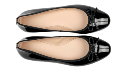 Two shiny black ballet-style flat shoes are positioned vertically against a solid dark background