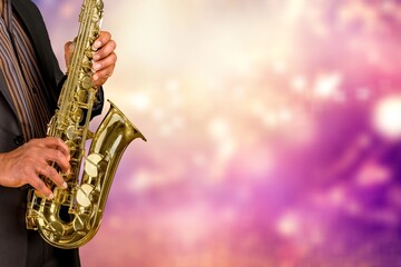 jazzman musician playing saxophone in neon light.