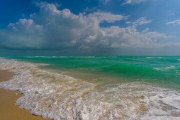 Sea wave. Blue ocean waves. Foamy wave. Rolling sea beach waves. Gentle sea beach wave. Summer sea beach.