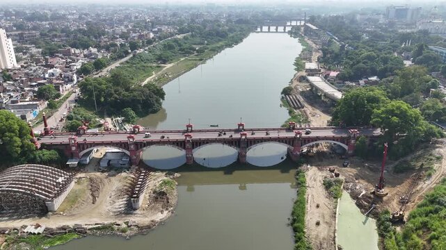 Aerial shot of running traffic at Gomti River Bridge in Lucknow, Uttar Pradesh, India