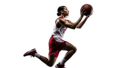 Dynamic female basketball player in mid-air about to shoot ball