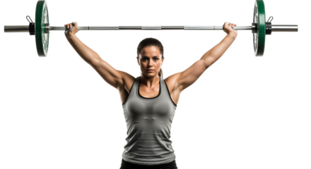 Determined woman lifts barbell overhead in weightlifting exercise