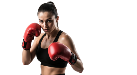 Focused female boxer in fighting stance with red gloves on white backdrop