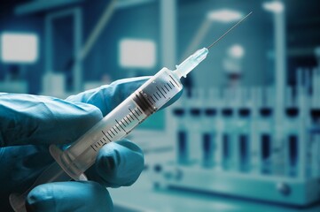 Medical hiv vaccination concept, hand hold syringe